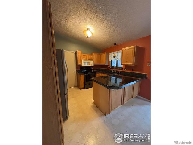 6005 Mossycup Court, Loveland, CO 80538