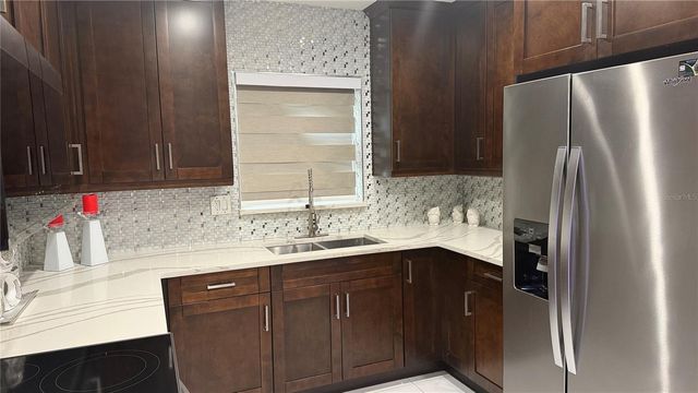 2106 W CLUSTER AVENUE, Tampa, FL 33604