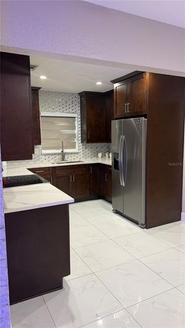 2106 W CLUSTER AVENUE, Tampa, FL 33604