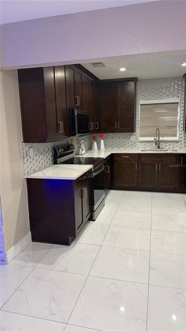 2106 W CLUSTER AVENUE, Tampa, FL 33604