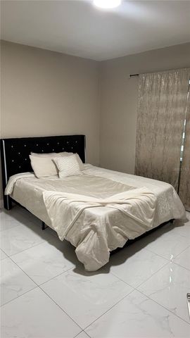 2106 W CLUSTER AVENUE, Tampa, FL 33604