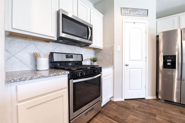 15303 Dinnet Berm Drive, Humble, TX 77346