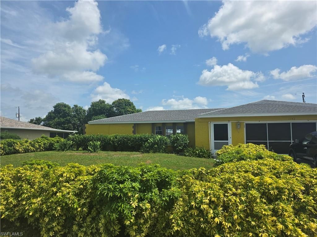 1542 Canal ST, Lehigh Acres, FL 33936