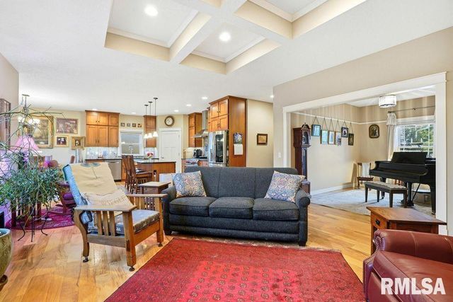 501 PRAIRIE MEADOWS Drive, Blue Grass, IA 52726