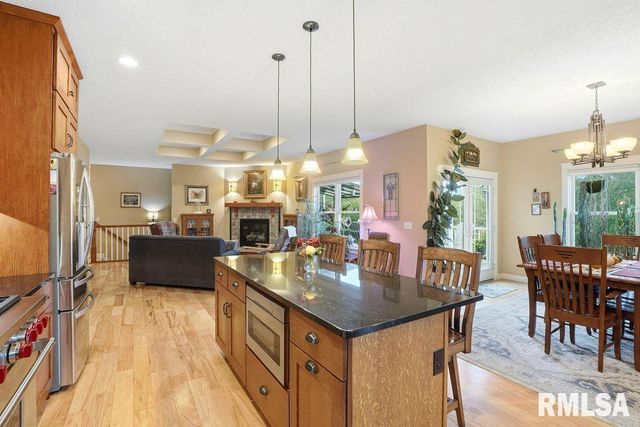 501 PRAIRIE MEADOWS Drive, Blue Grass, IA 52726