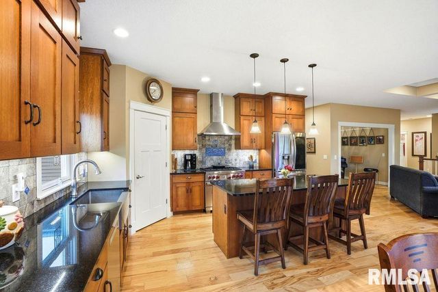 501 PRAIRIE MEADOWS Drive, Blue Grass, IA 52726