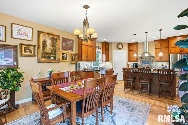 501 PRAIRIE MEADOWS Drive, Blue Grass, IA 52726