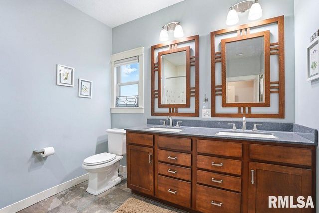 501 PRAIRIE MEADOWS Drive, Blue Grass, IA 52726