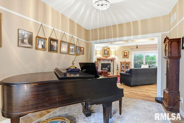 501 PRAIRIE MEADOWS Drive, Blue Grass, IA 52726