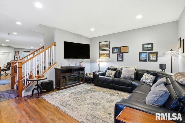 501 PRAIRIE MEADOWS Drive, Blue Grass, IA 52726