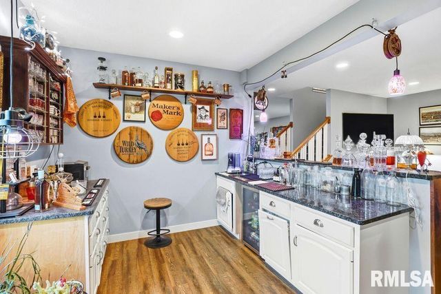 501 PRAIRIE MEADOWS Drive, Blue Grass, IA 52726