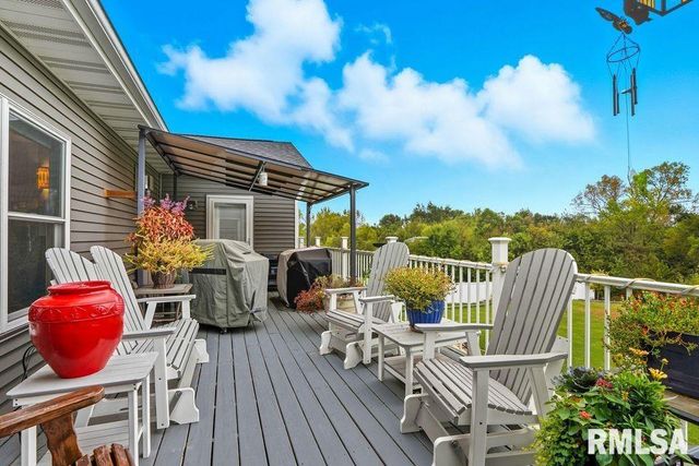 501 PRAIRIE MEADOWS Drive, Blue Grass, IA 52726