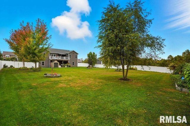 501 PRAIRIE MEADOWS Drive, Blue Grass, IA 52726