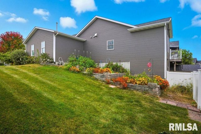 501 PRAIRIE MEADOWS Drive, Blue Grass, IA 52726