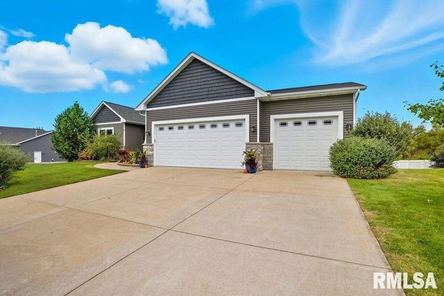 501 PRAIRIE MEADOWS Drive, Blue Grass, IA 52726