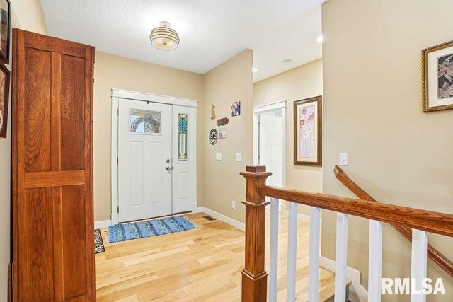 501 PRAIRIE MEADOWS Drive, Blue Grass, IA 52726