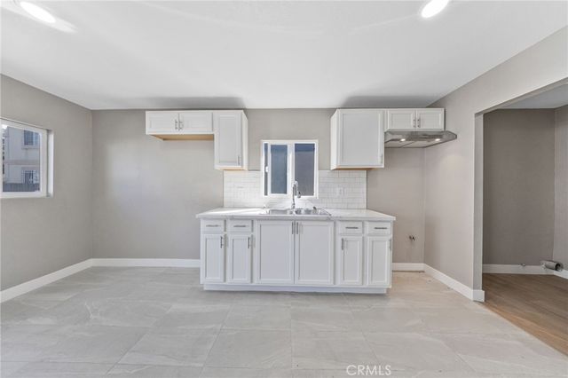 1202 E 76th Street, Los Angeles, CA 90001