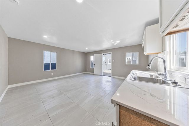 1202 E 76th Street, Los Angeles, CA 90001