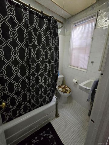 9308 103rd Avenue, Ozone Park, NY 11417