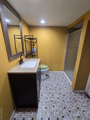 9308 103rd Avenue, Ozone Park, NY 11417
