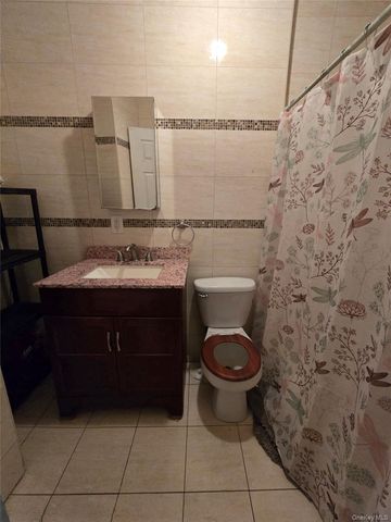 9308 103rd Avenue, Ozone Park, NY 11417