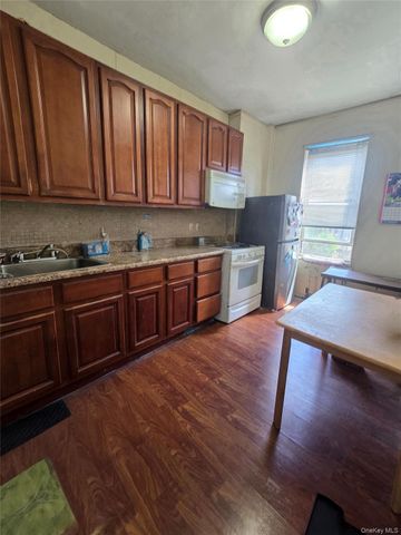 9308 103rd Avenue, Ozone Park, NY 11417