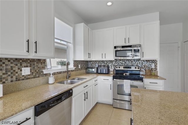 1557 Birdie DR, Naples, FL 34120