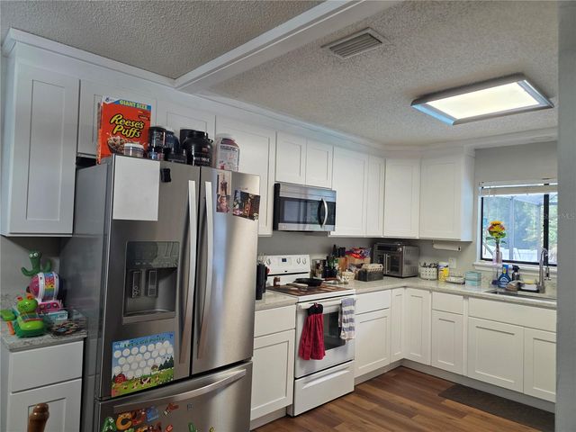 1040 W VILLAGE GREEN ROAD, Deland, FL 32720