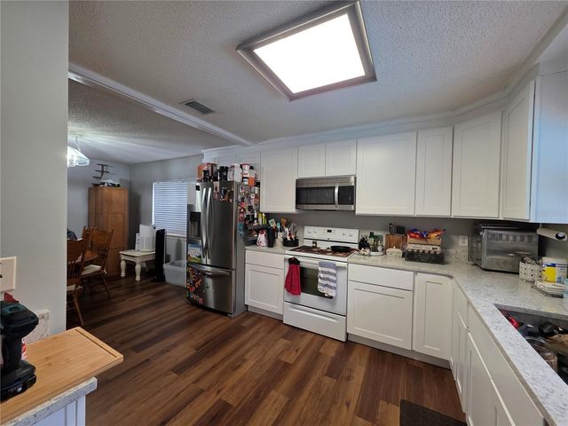 1040 W VILLAGE GREEN ROAD, Deland, FL 32720
