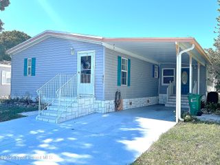 622 Dolphin Circle, Barefoot Bay, FL 32976