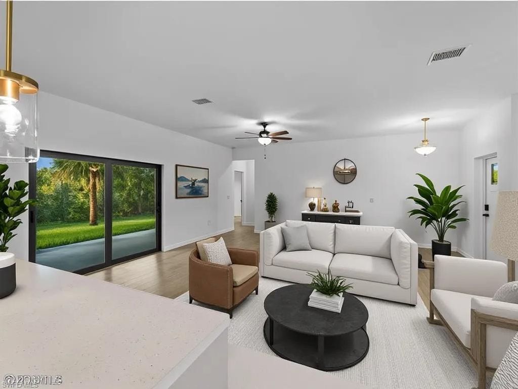 1131 Augusta ST E, LEHIGH ACRES, FL 33974 — photo 4