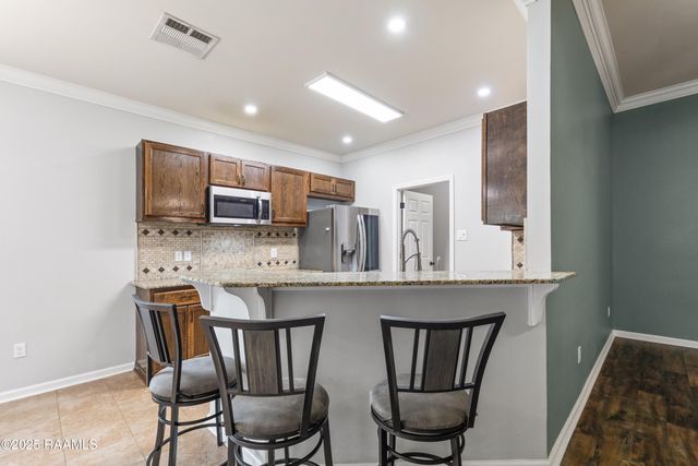 307 Flanders Ridge Drive, Youngsville, LA 70592