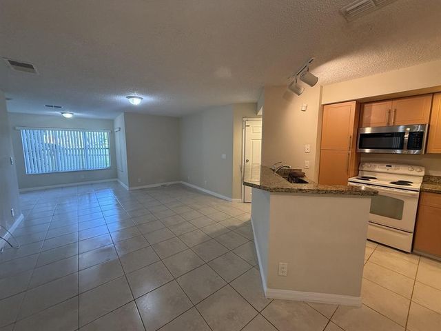 3390 Pinewalk Drive N 1012, Margate, FL 33063