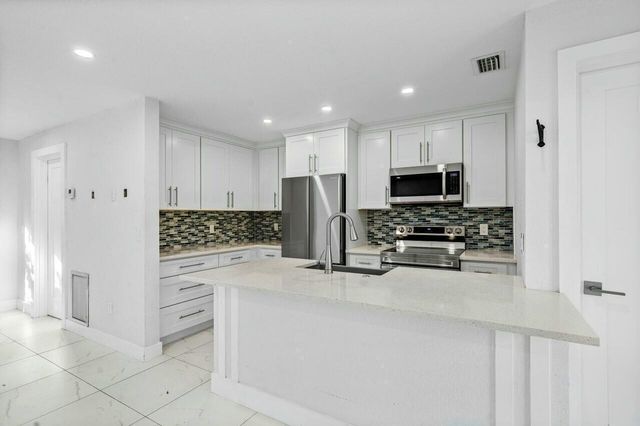 8719 40th Terrace N, Palm Beach Gardens, FL 33410