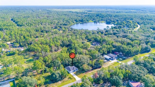 125 FISHER WAY, Ocklawaha, FL 32179