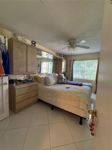 9041 Sunrise Lakes Boulevard 207, Sunrise, FL 33322