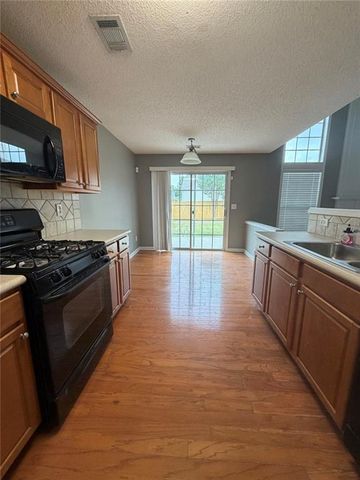 8835 Grappe Trace, Suwanee, GA 30024