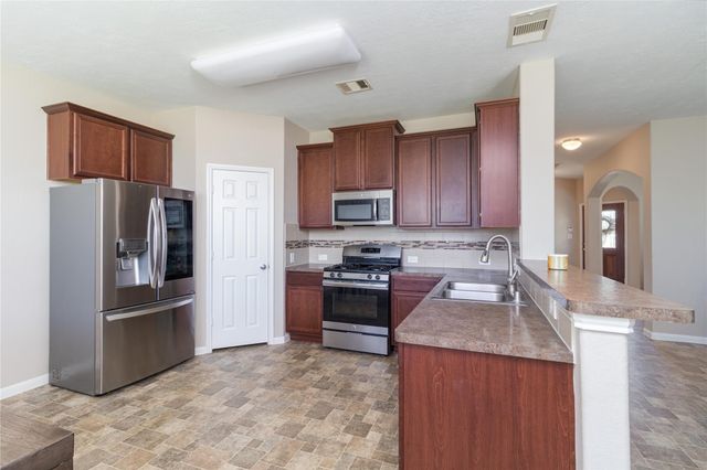 10731 Sun River Falls Drive, Humble, TX 77396