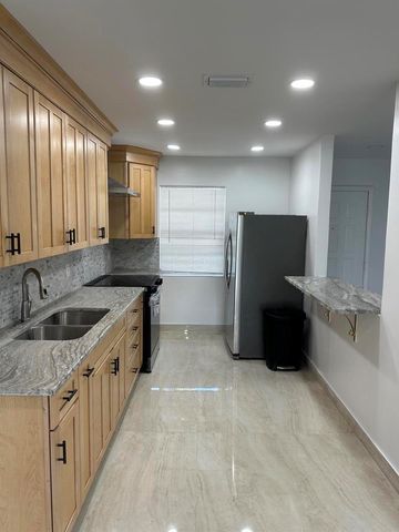 100 Lake Rebecca Drive, West Palm Beach, FL 33411