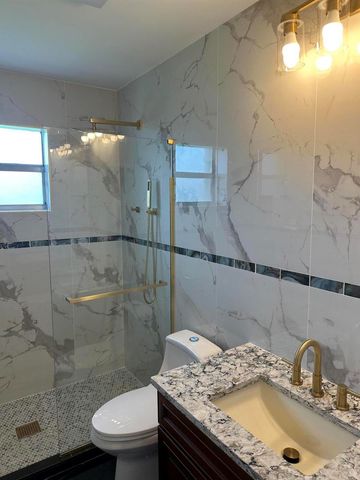 100 Lake Rebecca Drive, West Palm Beach, FL 33411