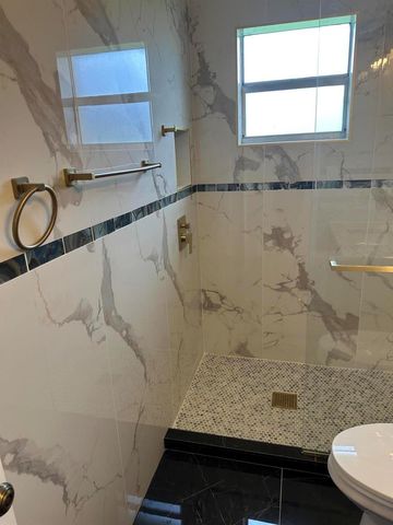 100 Lake Rebecca Drive, West Palm Beach, FL 33411