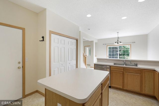 12155 Vermillion Street NE H, Blaine, MN 55449