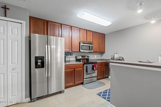 7039 DEER LODGE Circle 107, Jacksonville, FL 32256