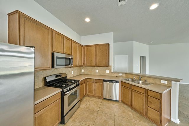 9935 Knob Hollow Way, Conroe, TX 77385