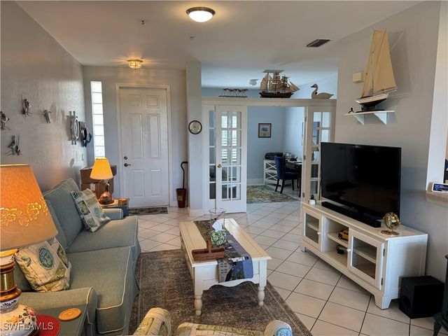 1420 Sweetwater CV 102, Naples, FL 34110