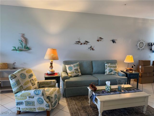 1420 Sweetwater CV 102, Naples, FL 34110