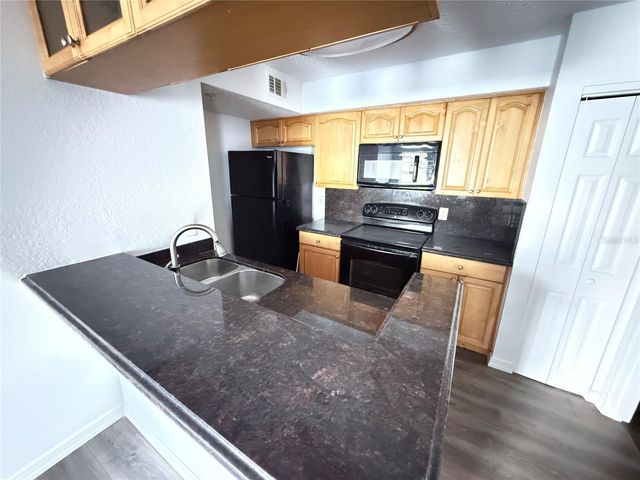 4105 TROPICAL ISLE BOULEVARD 217, Kissimmee, FL 34741