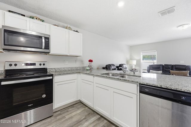 59 PICKERING Drive, Palm Coast, FL 32164