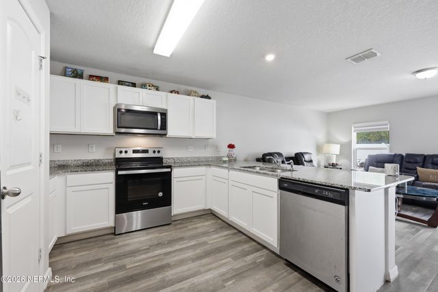 59 PICKERING Drive, Palm Coast, FL 32164