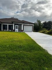 719 Harry AVE S, Lehigh Acres, FL 33973